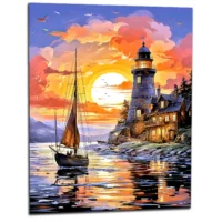 petit voilier et phare au coucher de soleil