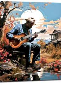 musicien jouant de la guitare sous un arbre